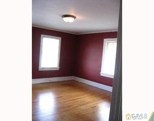 176 Washington Road Sayreville, NJ 08872 - Photo 7 of 8 a view of an empty room and window