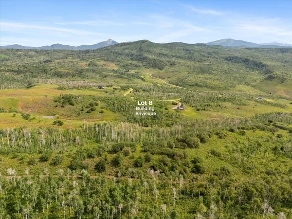 a view of a city with an ocean