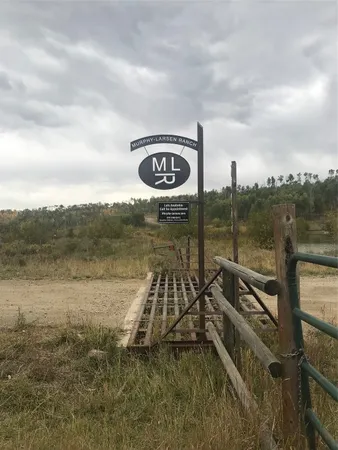 a view of a lake with a big yard