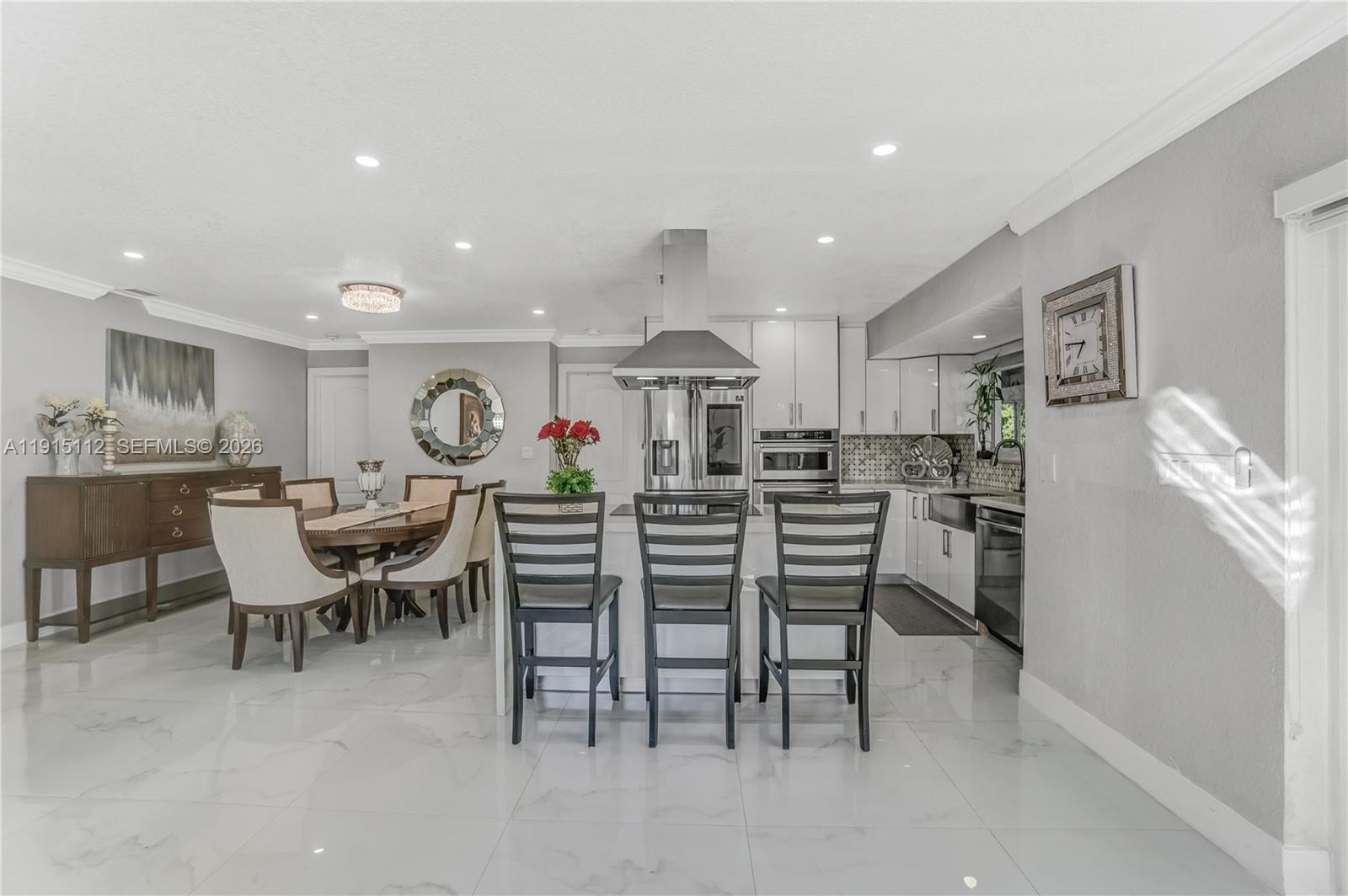 12601 Southwest 204th Street Miami, FL 33177 - Photo 29 of 40 a view of a dining room with furniture