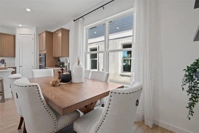 a living room with fireplace a couch and a flat screen tv
