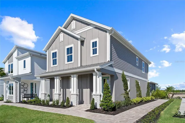 a view of a livingroom with furniture and wooden floor