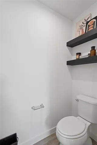 a bathroom with a bathtub and a window