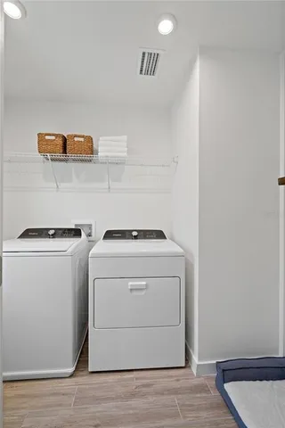 a bedroom with a bed and closet