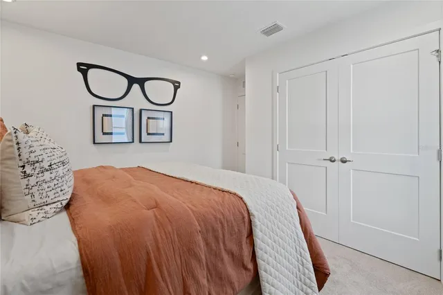 a living room with furniture and flat screen tv