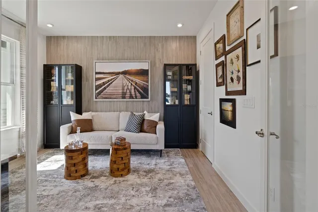 a living room with furniture and a gate