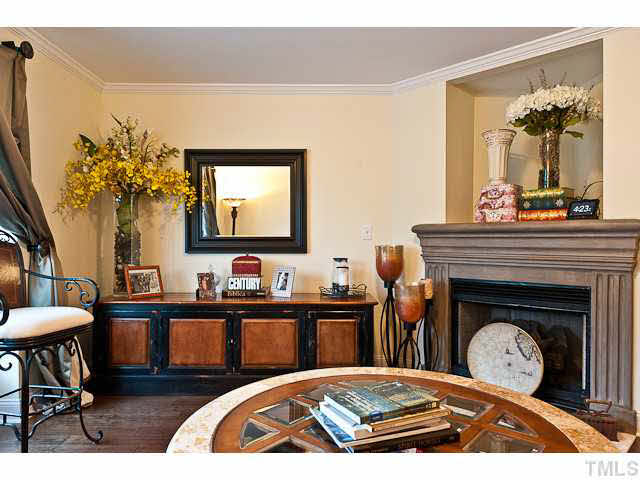 9710 Layla Avenue Raleigh, NC 27617 - Photo 6 of 25 Custom surround fireplace.