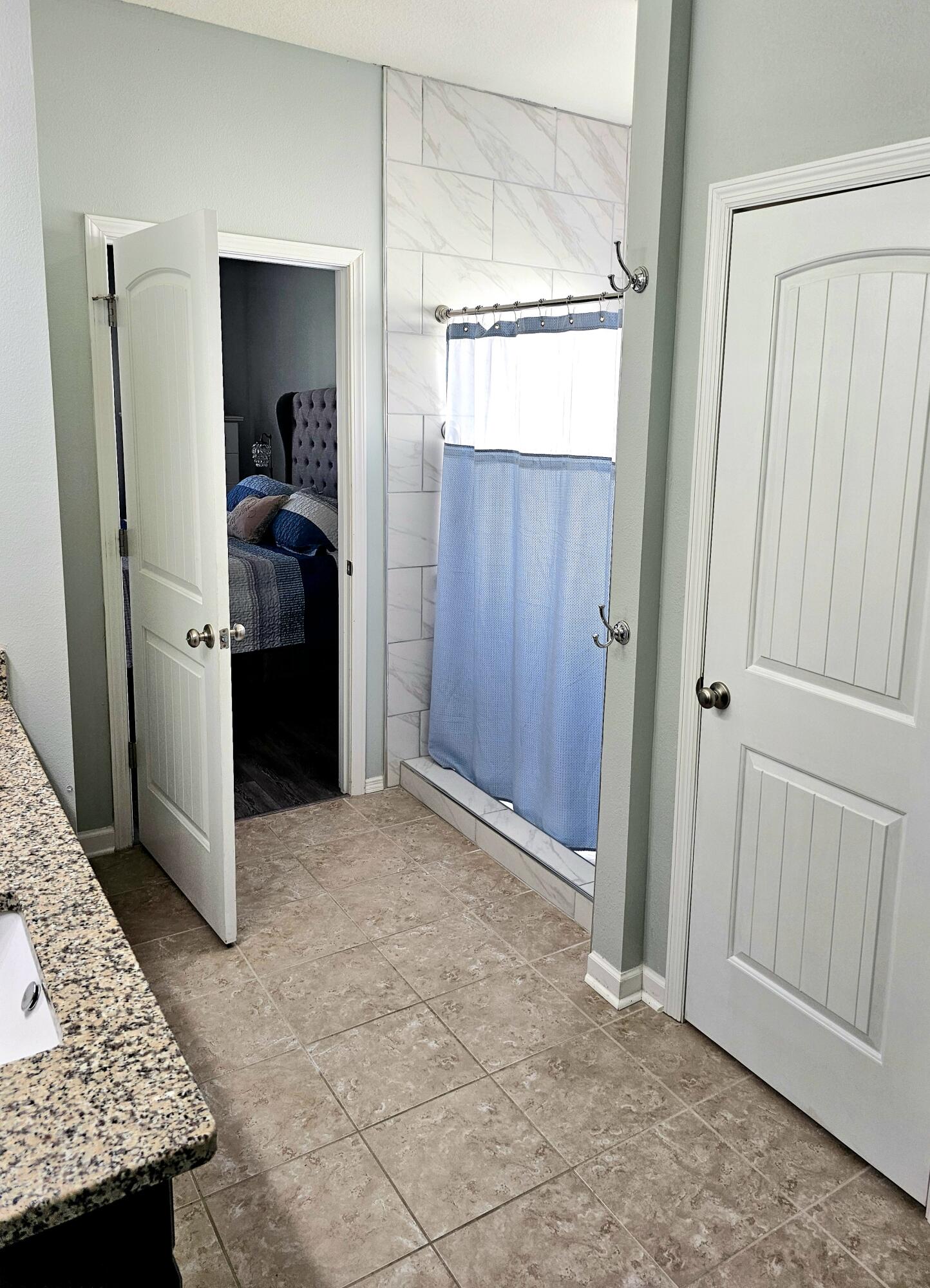 140 Nelly Street Freeport, FL 32439 - Photo 28 of 53 an empty room with closet and a hallway