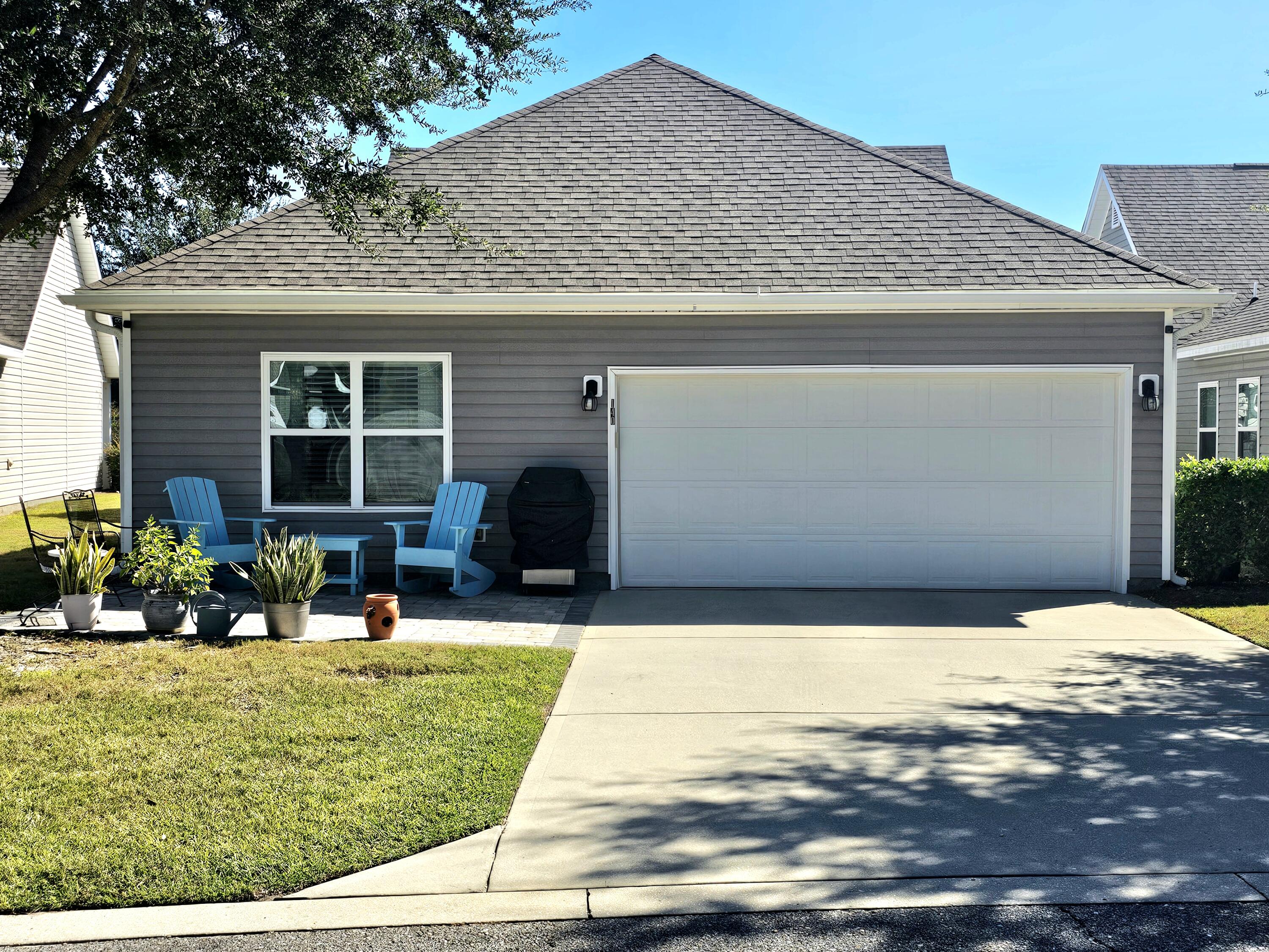 140 Nelly Street Freeport, FL 32439 - Photo 33 of 53 a house view with swimming pool in front of it