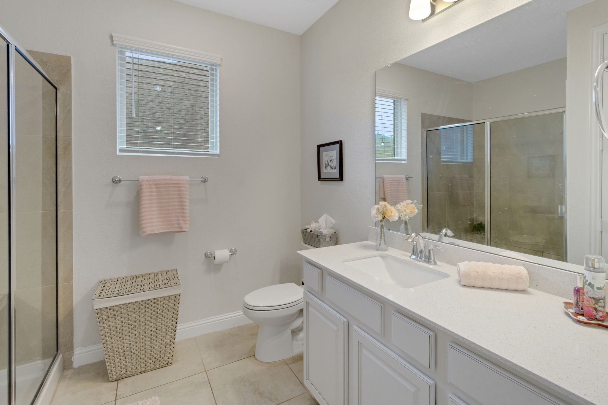19248 Yellow Chestnut Lane New Caney, TX 77357 - Photo 35 of 42 a bathroom with a sink toilet and shower