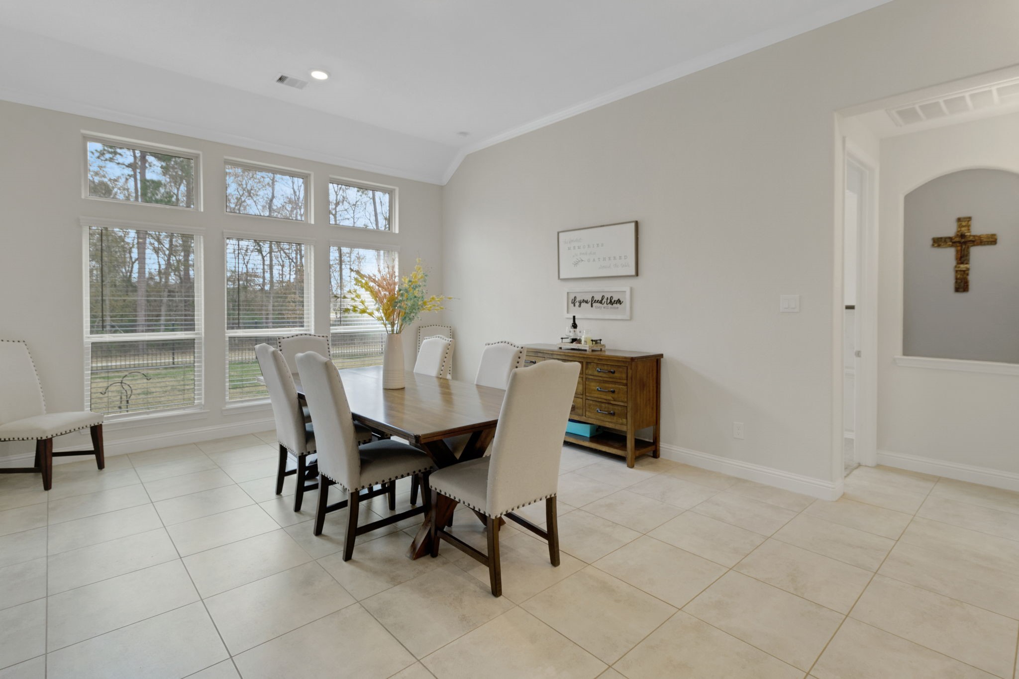 19248 Yellow Chestnut Lane New Caney, TX 77357 - Photo 7 of 42 a dining room with furniture and window