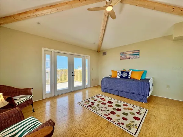 a view of a room that has a large window