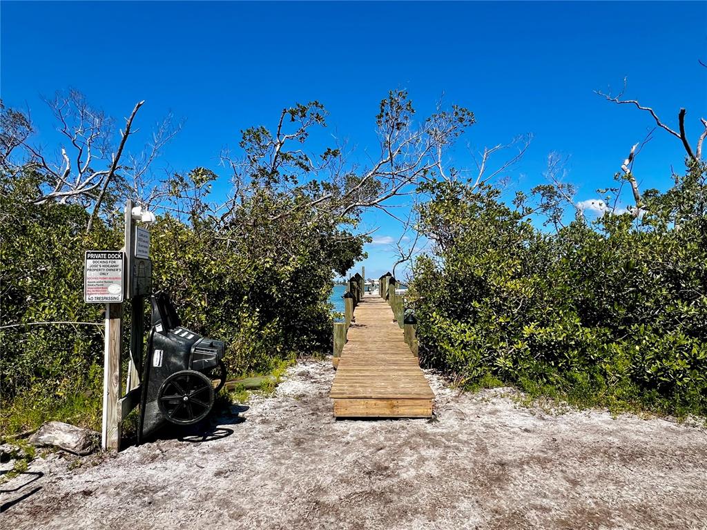 9580 Almirate Court Placida, FL 33946 - Photo 43 of 59 a view of a pathway of a building