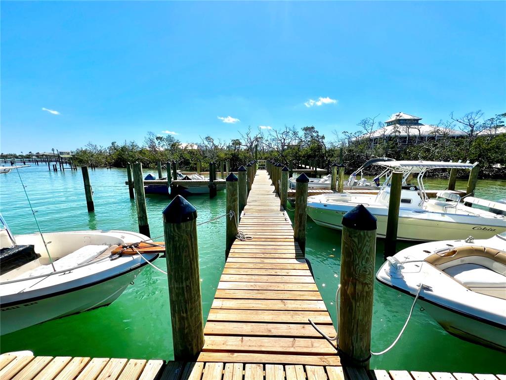 9580 Almirate Court Placida, FL 33946 - Photo 45 of 59 a view of a lake with couches chairs