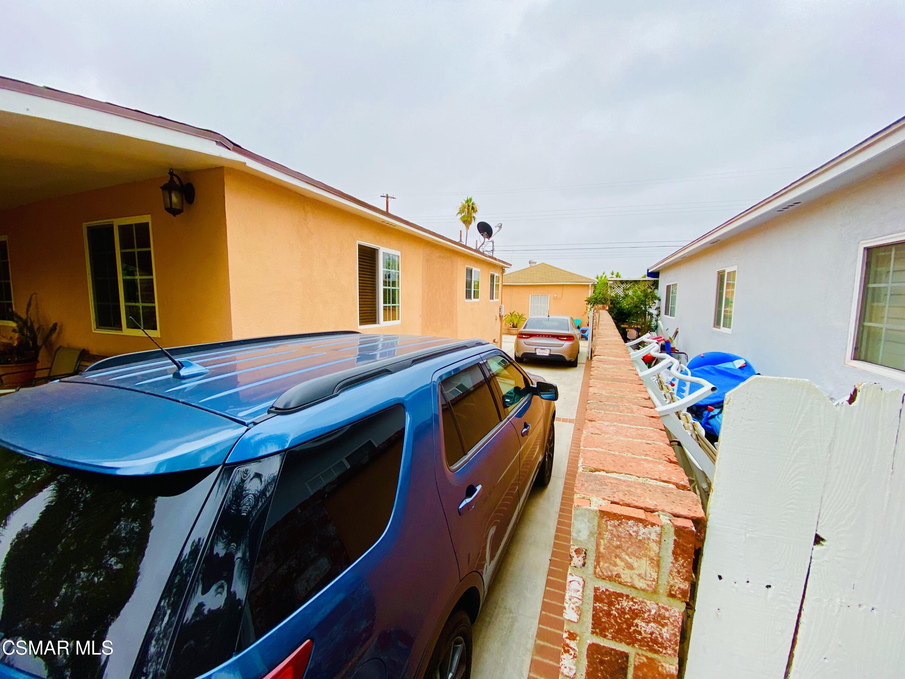 13628 Wingo Street Arleta, CA 91331 - Photo 3 of 55 a view of a patio with table and chairs