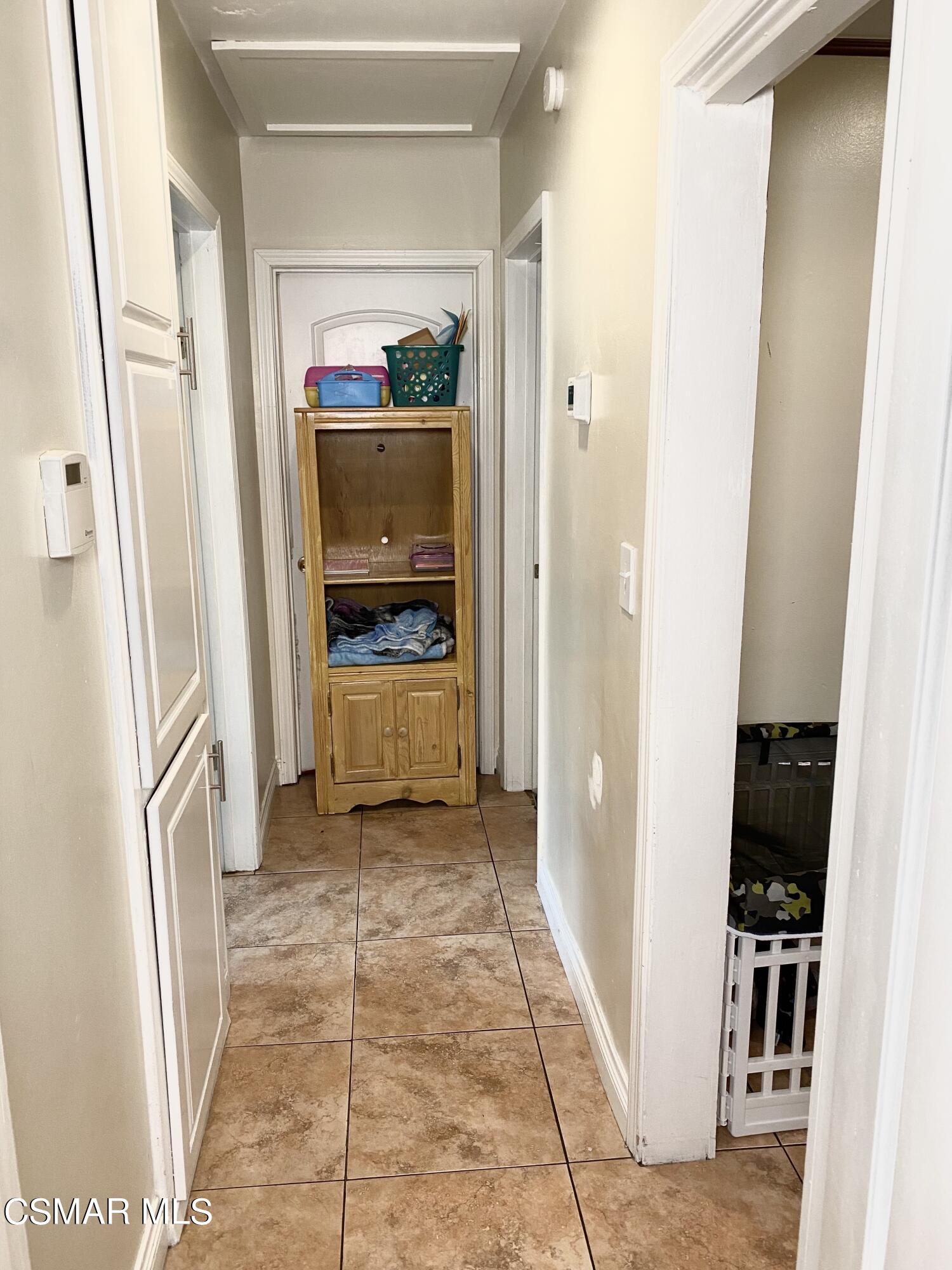 13628 Wingo Street Arleta, CA 91331 - Photo 32 of 55 a view of a hallway view with wooden floor and staircase