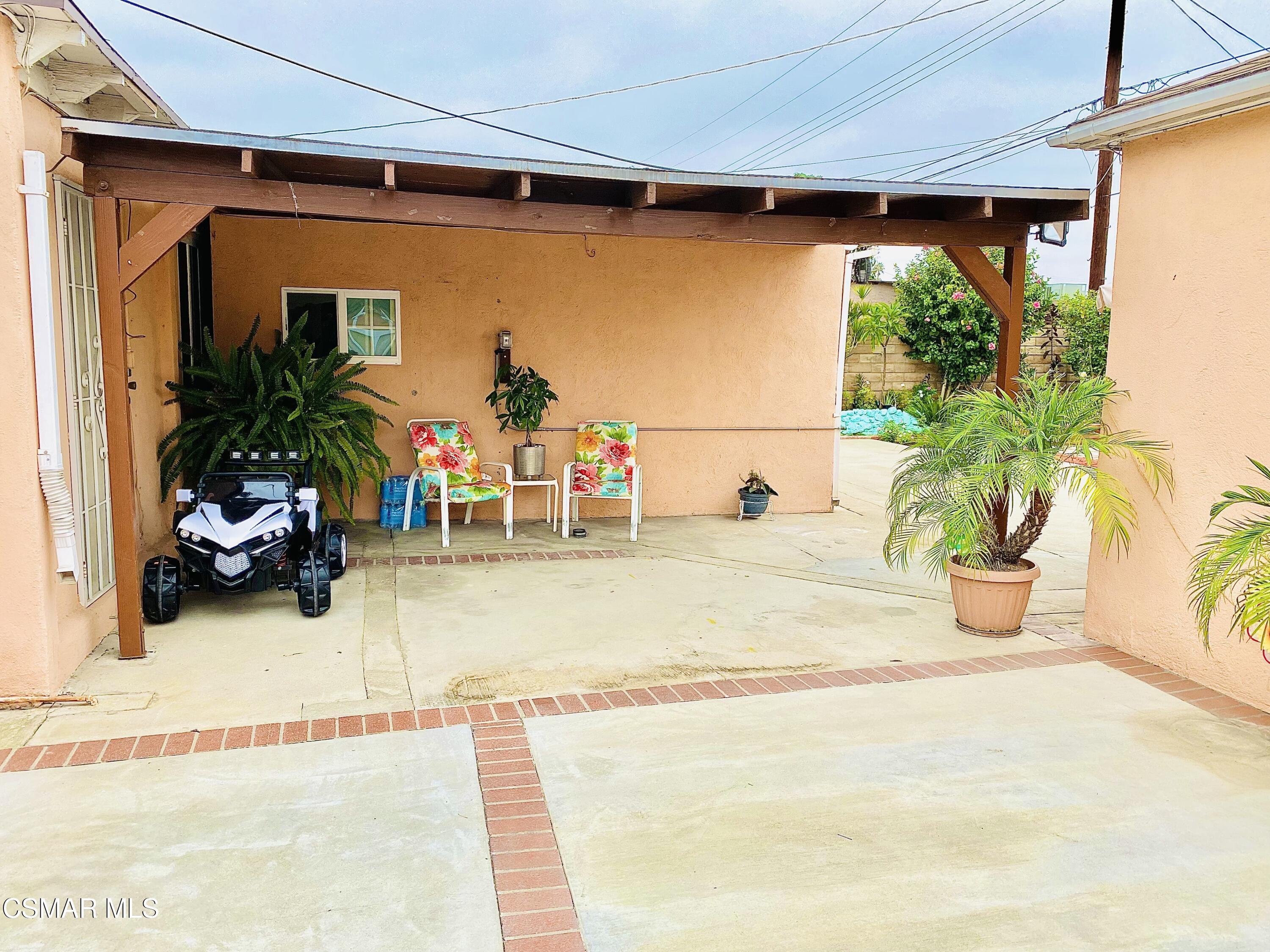 13628 Wingo Street Arleta, CA 91331 - Photo 42 of 55 a view of front door and potted plants