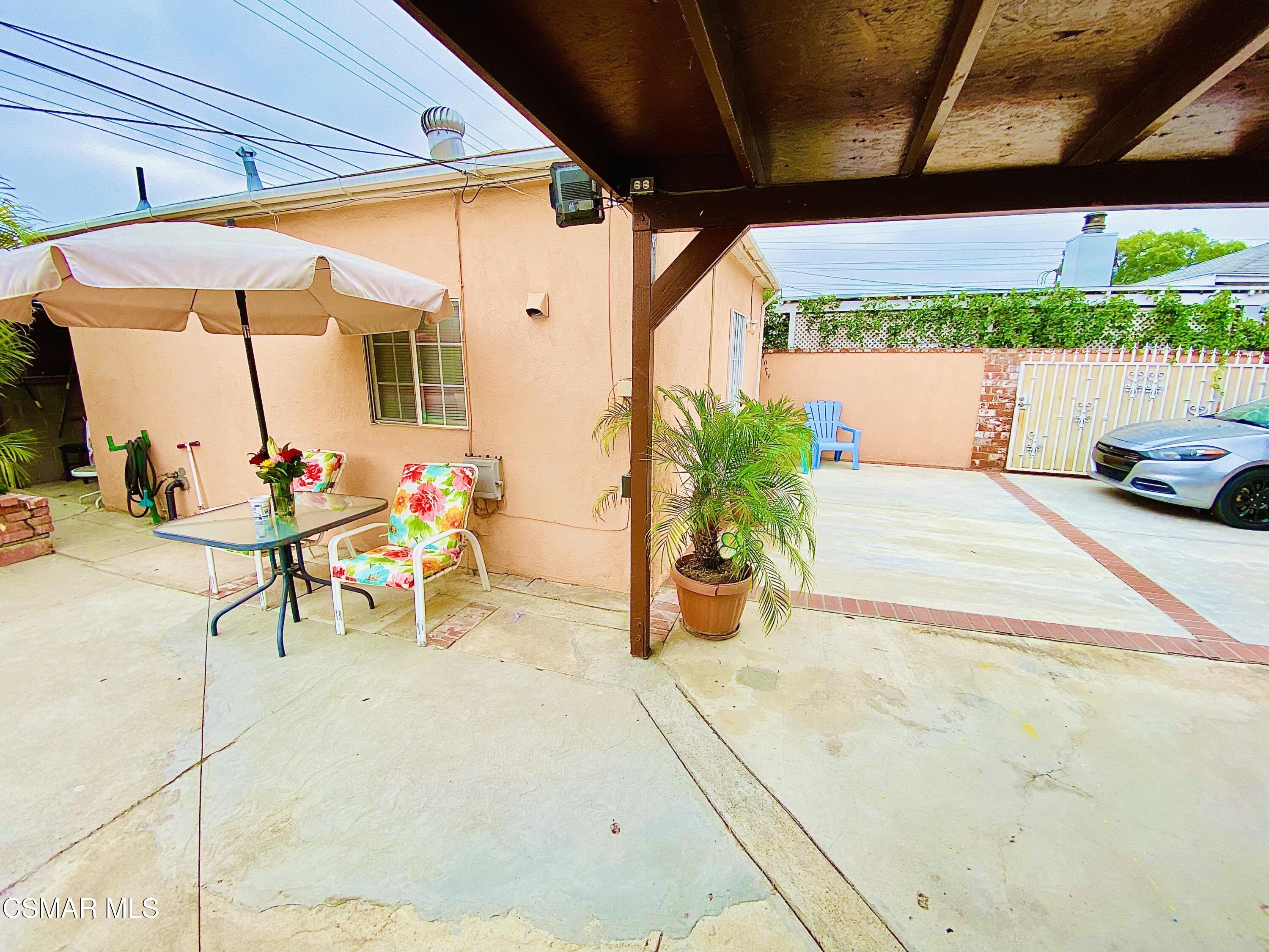 13628 Wingo Street Arleta, CA 91331 - Photo 44 of 55 a view of an outdoor dining space with patio