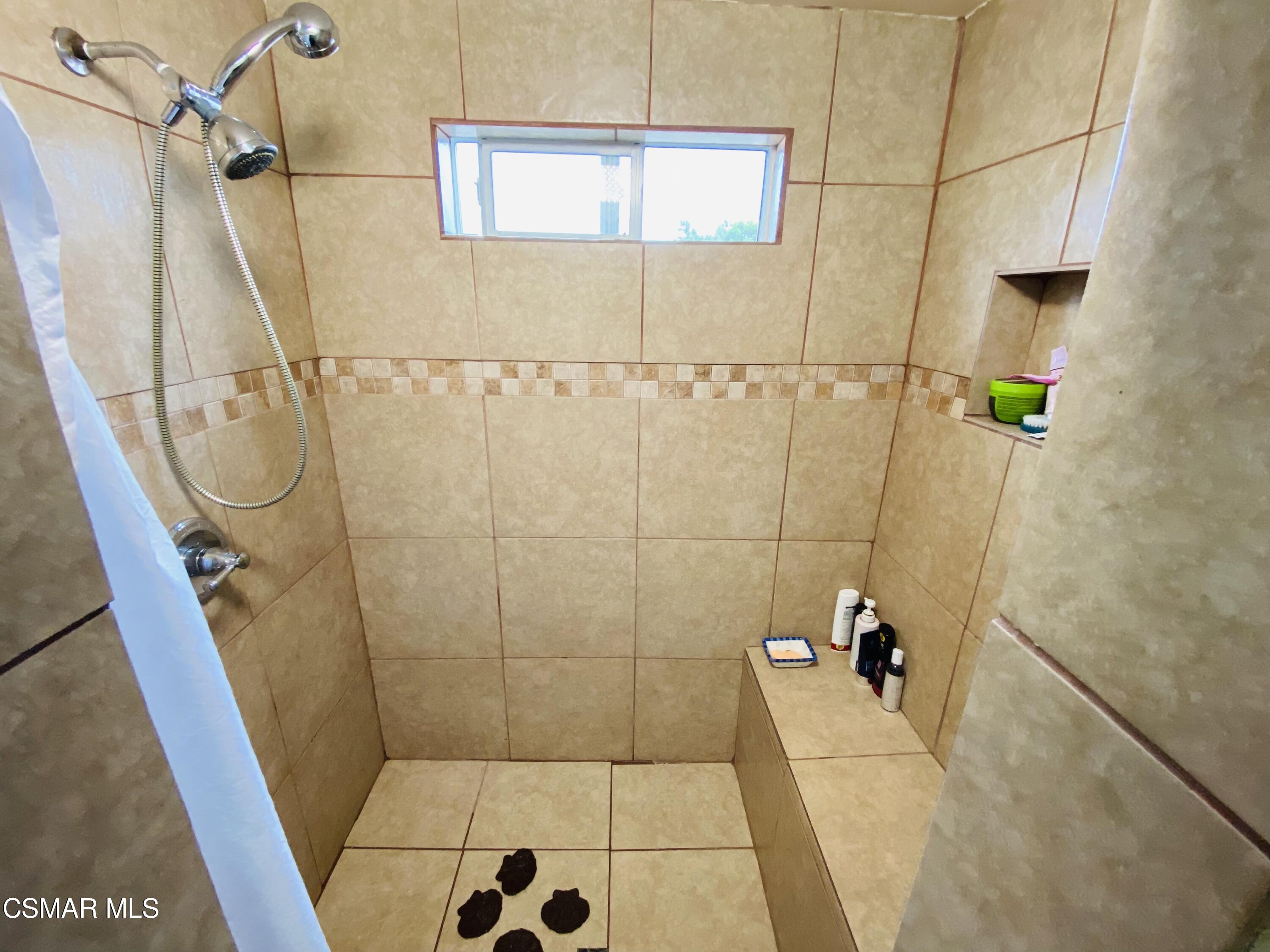 13628 Wingo Street Arleta, CA 91331 - Photo 51 of 55 a bathroom with a shower