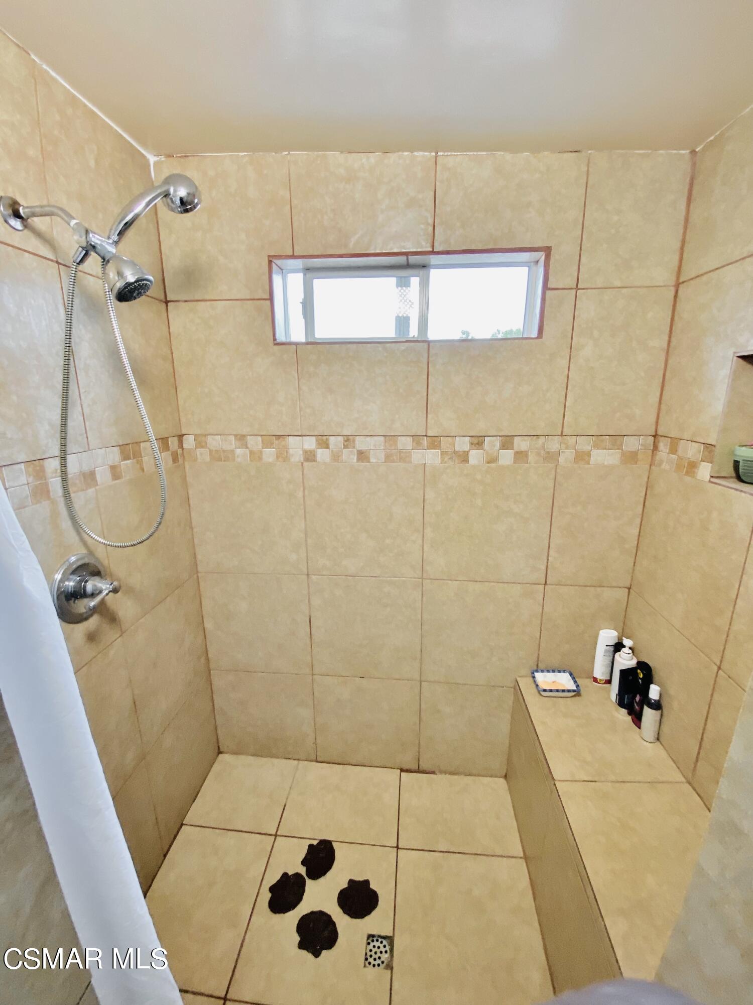 13628 Wingo Street Arleta, CA 91331 - Photo 52 of 55 a bathroom with a shower
