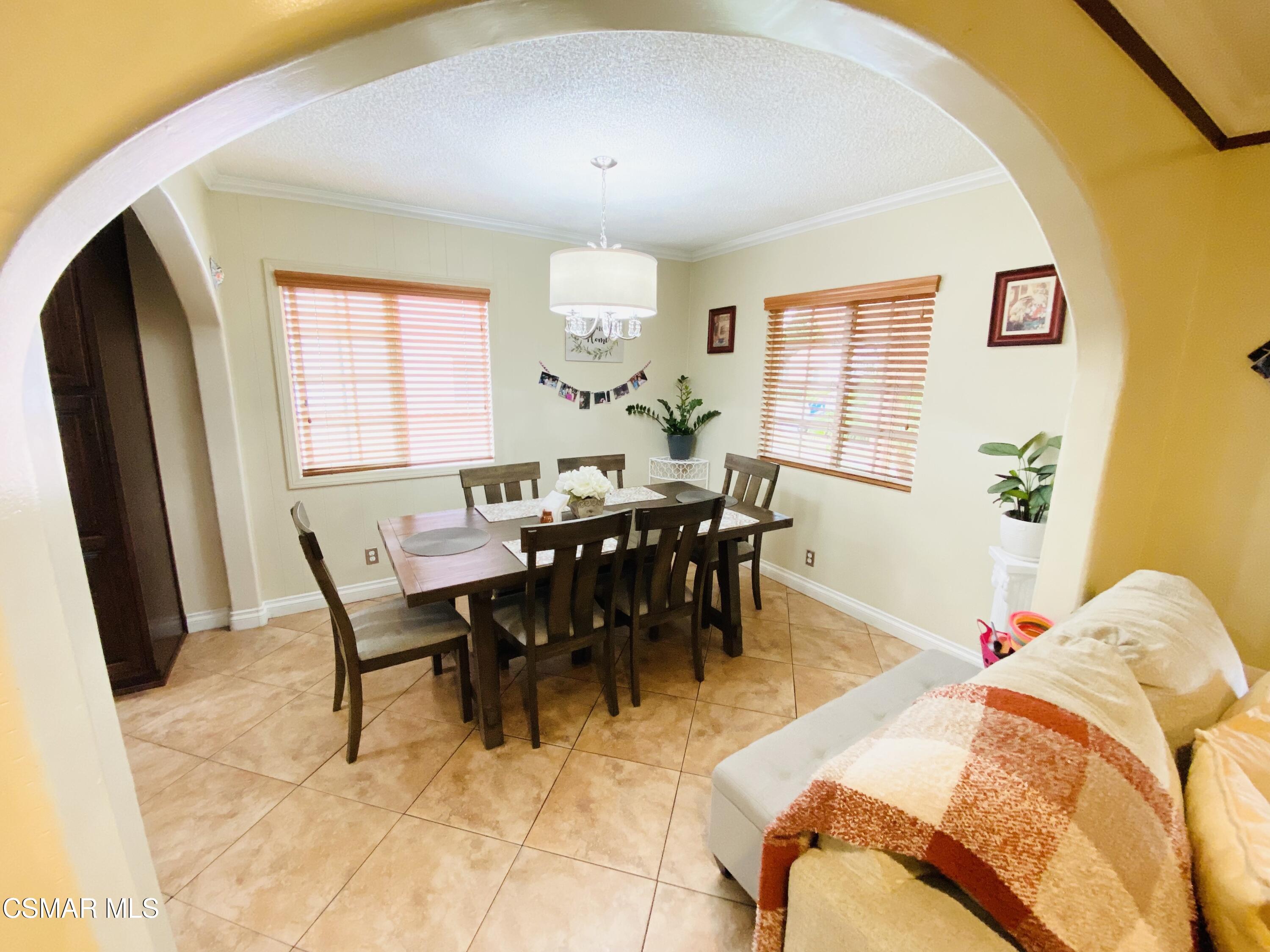 13628 Wingo Street Arleta, CA 91331 - Photo 10 of 55 a view of a dining room with furniture