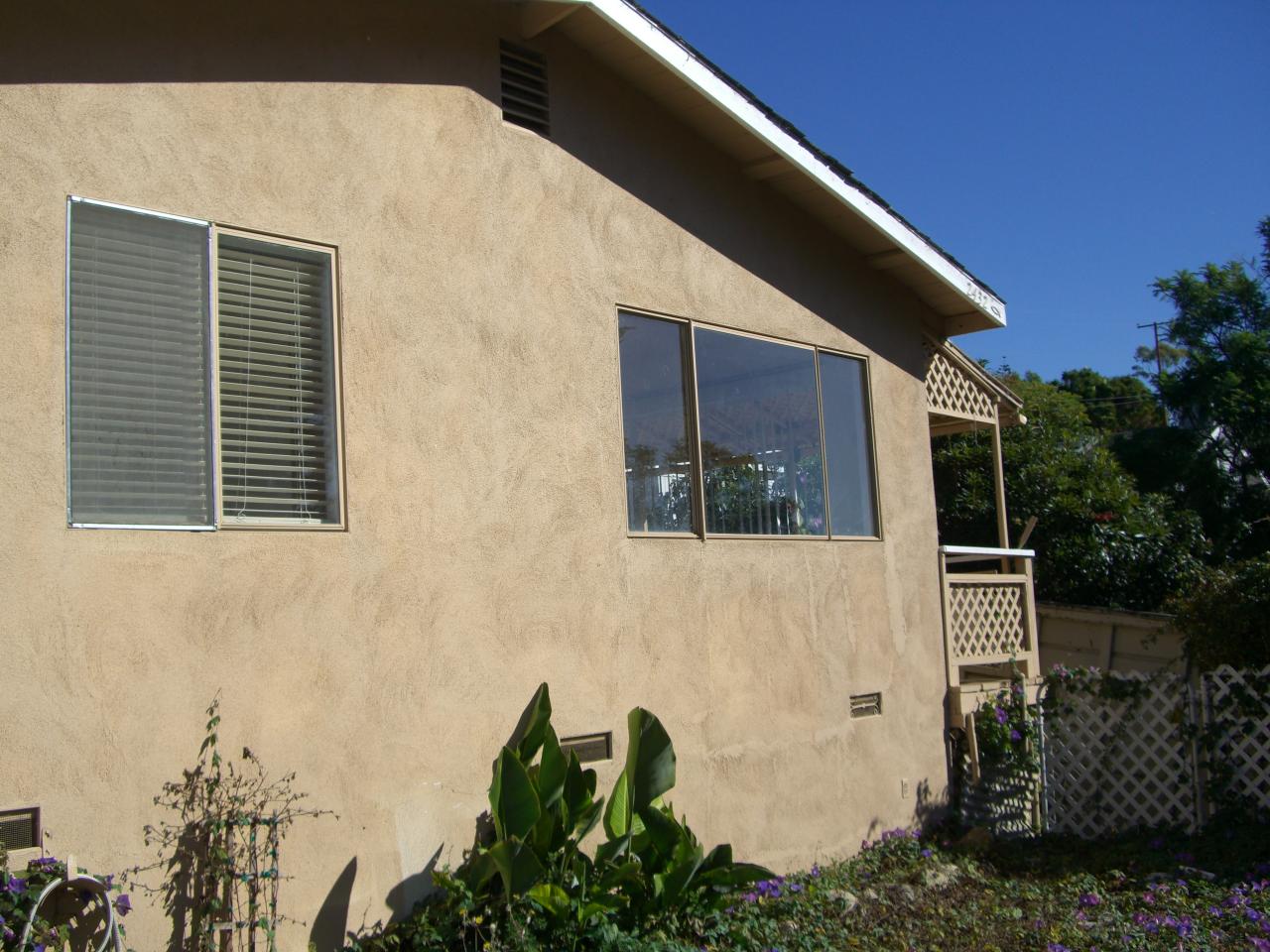a backyard of a house with lots of green space