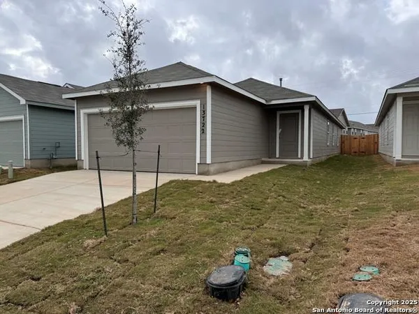 a house with trees in front of it