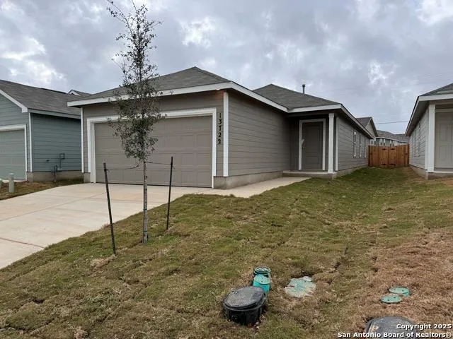 a house with trees in front of it