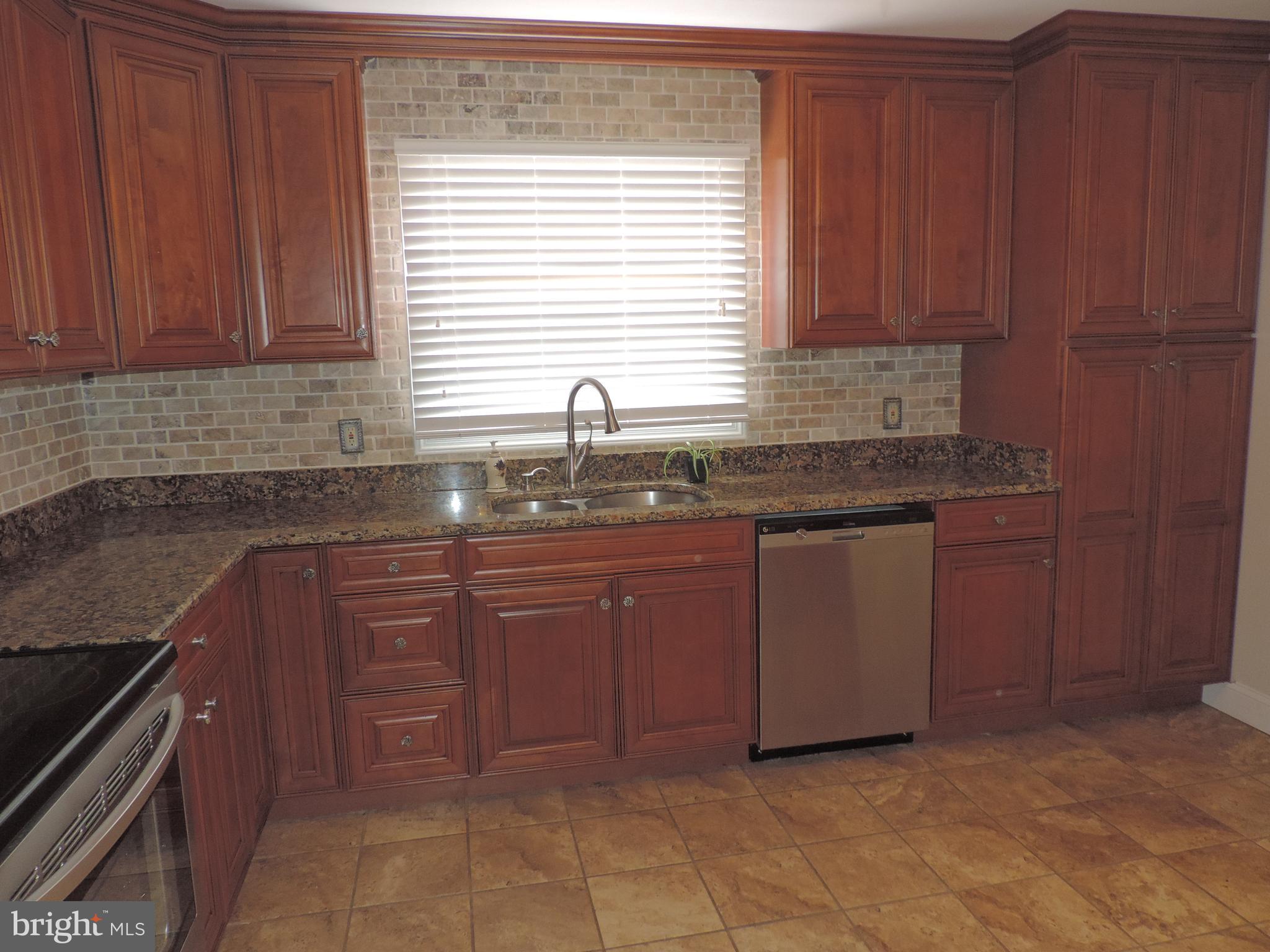 607 Paradise Road Aberdeen, MD 21001 - Photo 12 of 39 Updated Kitchen with granite counters