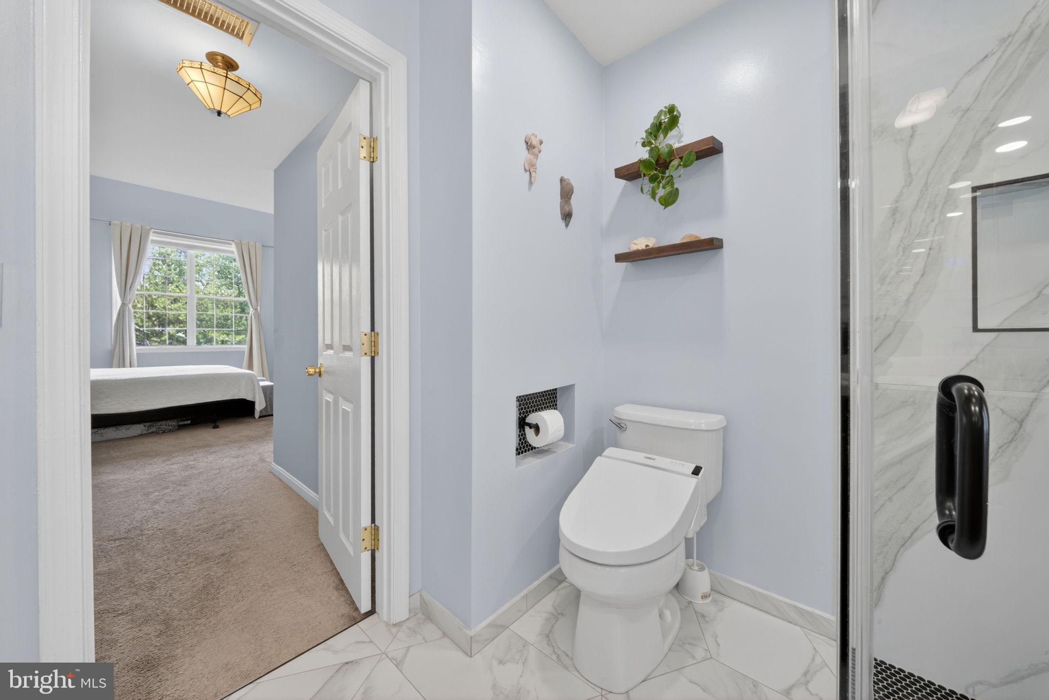 6006 Lincolnia Road Alexandria, VA 22312 - Photo 30 of 42 Serene bathroom with soft blue hues.