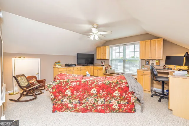 a bed room with a bed and furniture