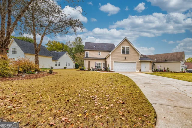 a house with trees in front of it