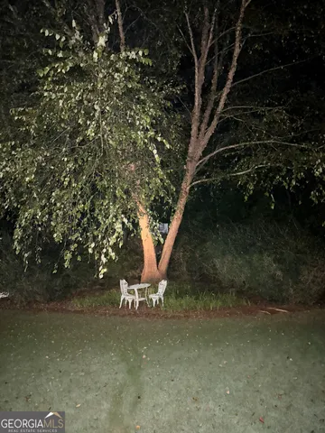 a view of outdoor space and yard