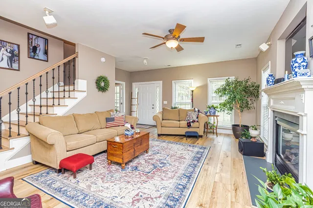 a living room with furniture or couch and a fireplace