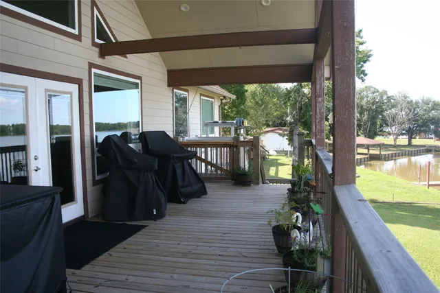 a living room filled with furniture and garden view