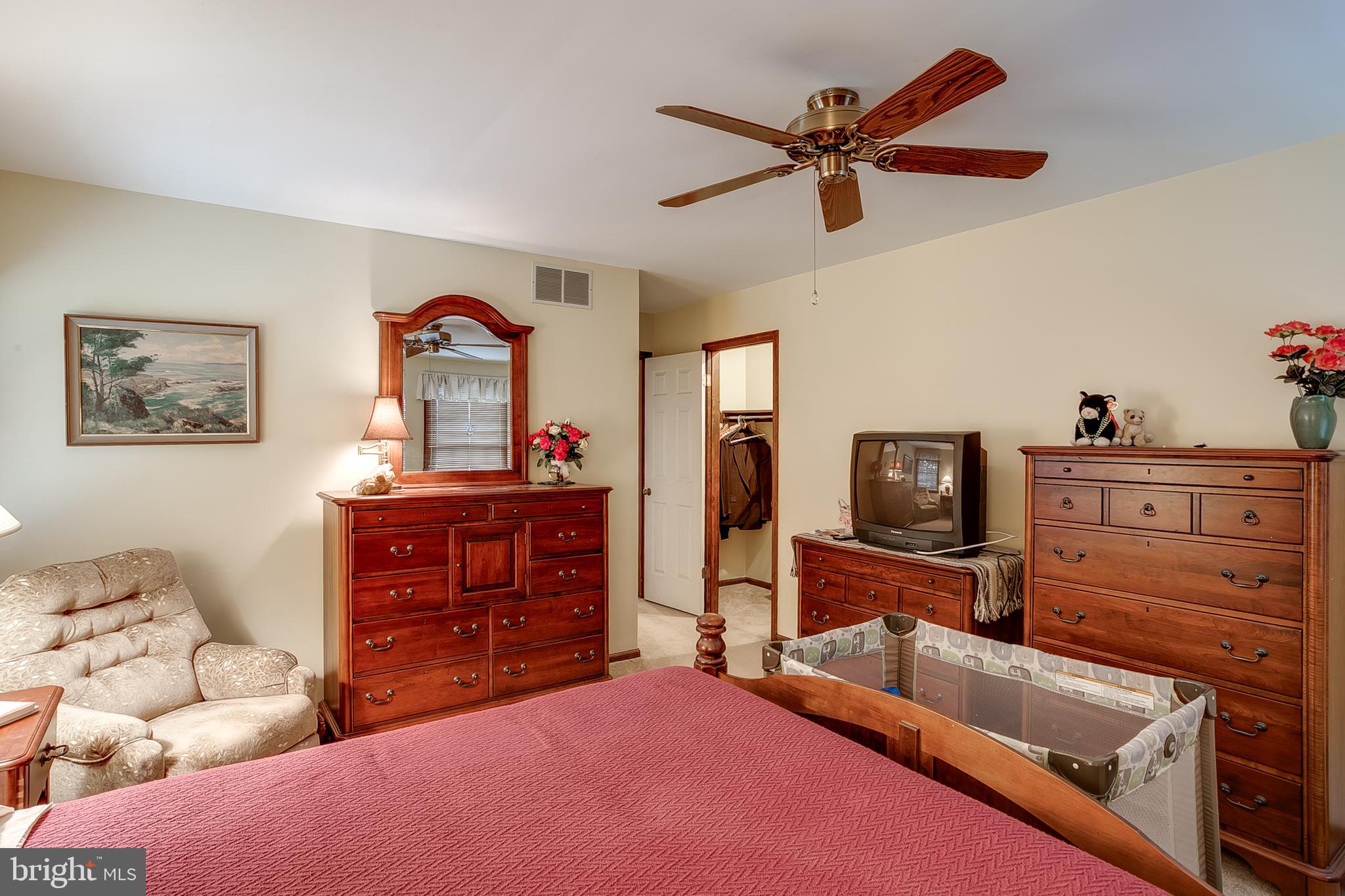 402 Doerrmann Drive Mickleton, NJ 08056 - Photo 22 of 34 a bedroom with furniture and a flat screen tv