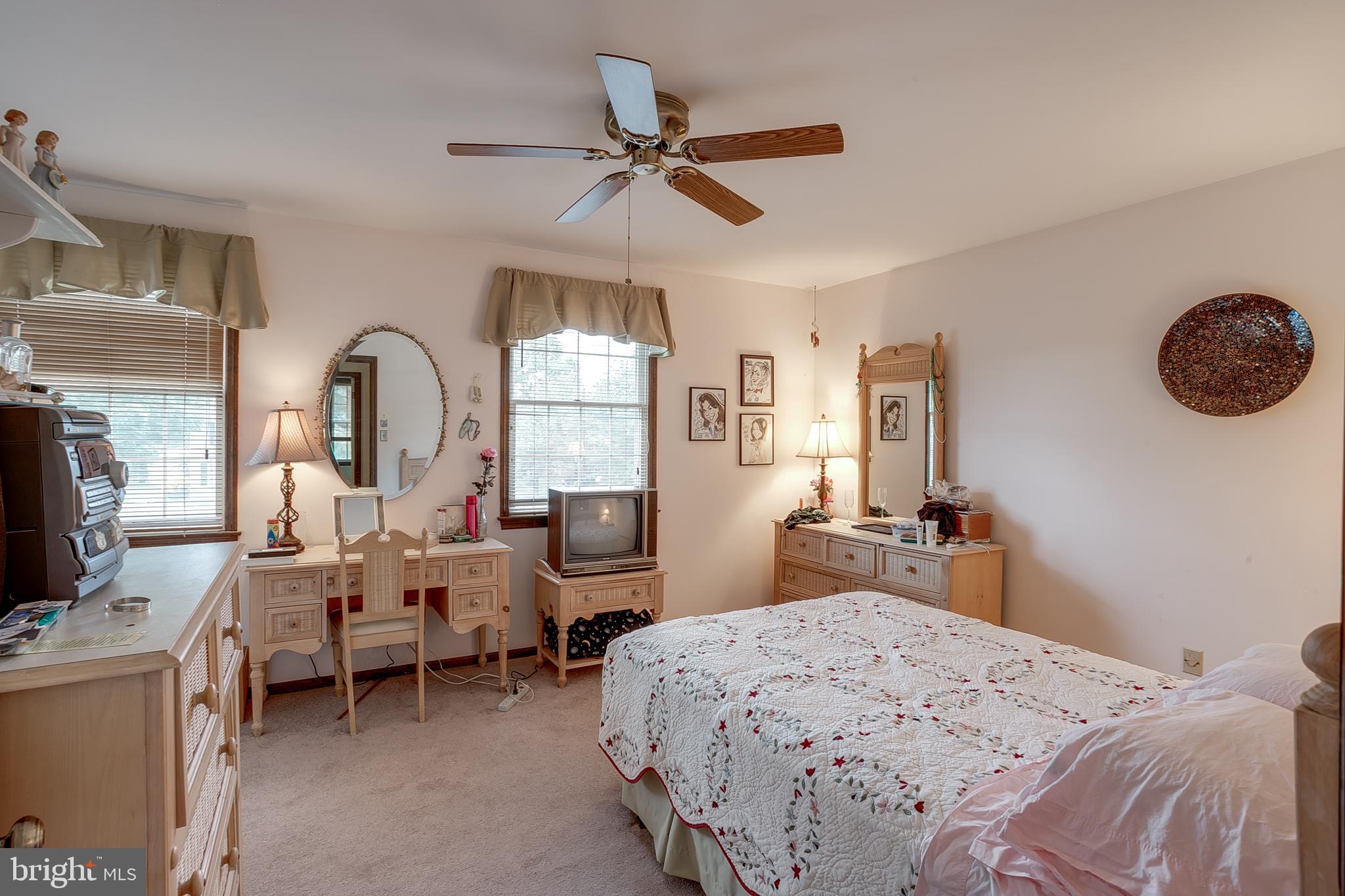 402 Doerrmann Drive Mickleton, NJ 08056 - Photo 26 of 34 a bedroom with furniture and a large window