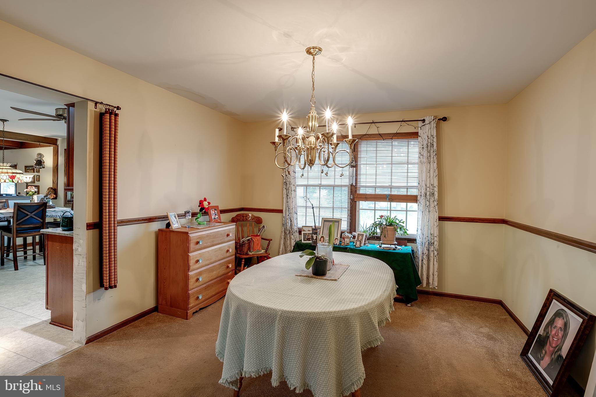 402 Doerrmann Drive Mickleton, NJ 08056 - Photo 8 of 34 a dining room with furniture and window