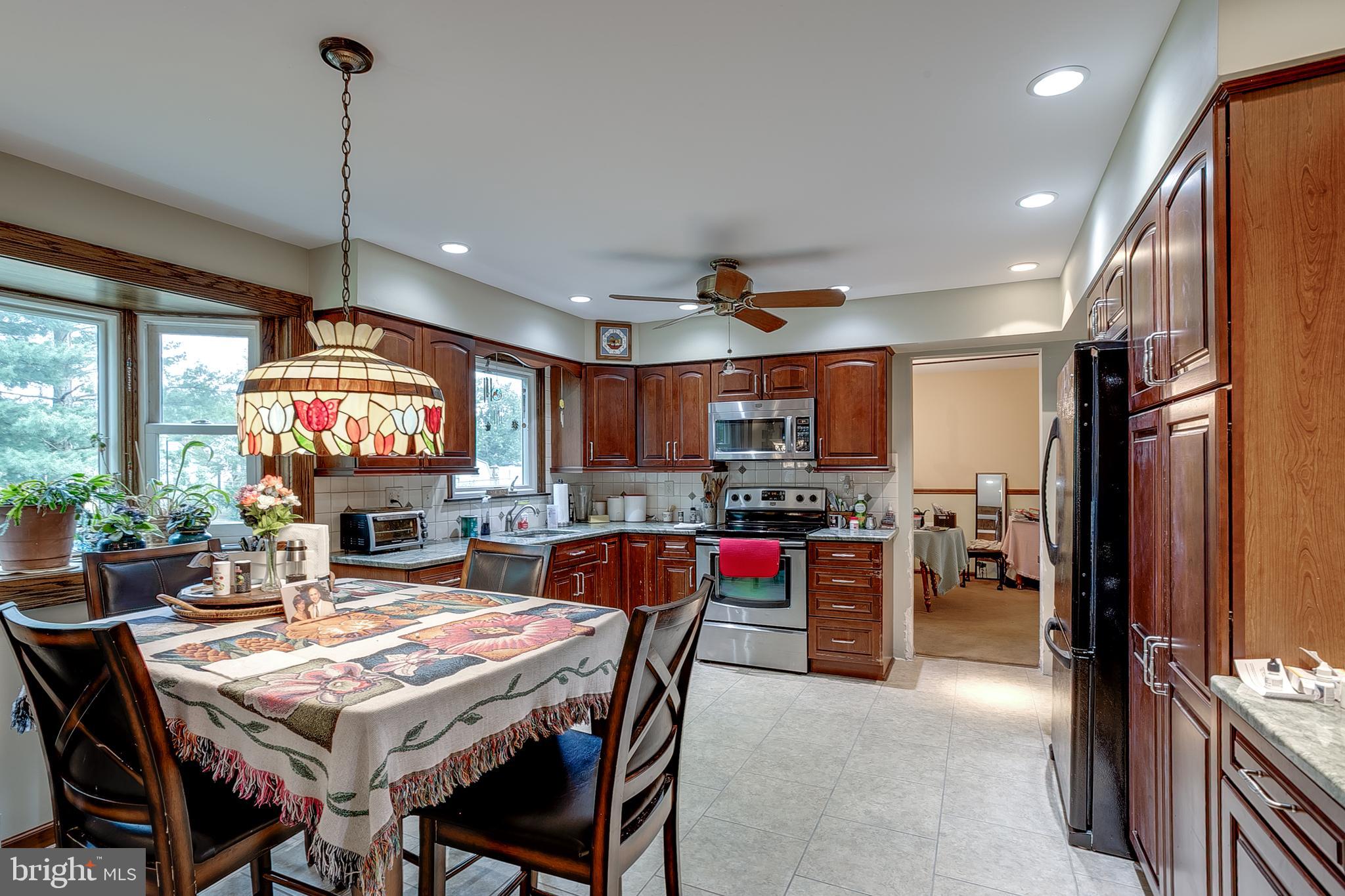 402 Doerrmann Drive Mickleton, NJ 08056 - Photo 9 of 34 a view of a dining room and livingroom view