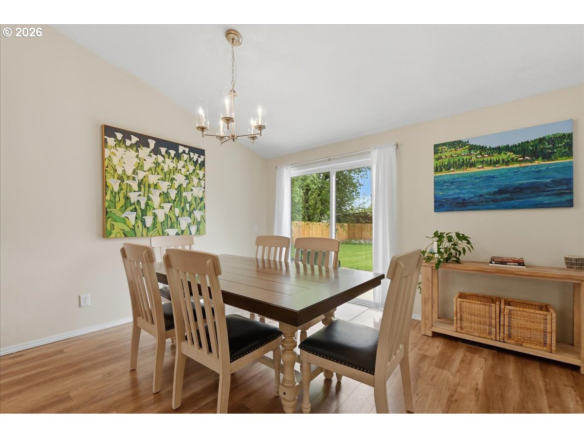 4620 Southwest 183rd Court Beaverton, OR 97078 - Photo 12 of 34 a dining room with furniture and window
