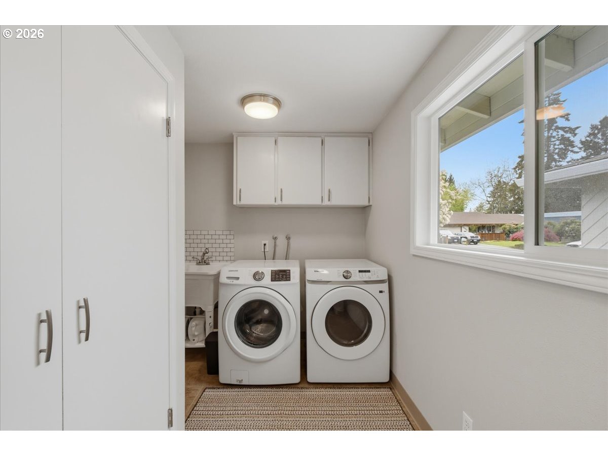 4620 Southwest 183rd Court Beaverton, OR 97078 - Photo 19 of 34 a utility room with dryer and washer