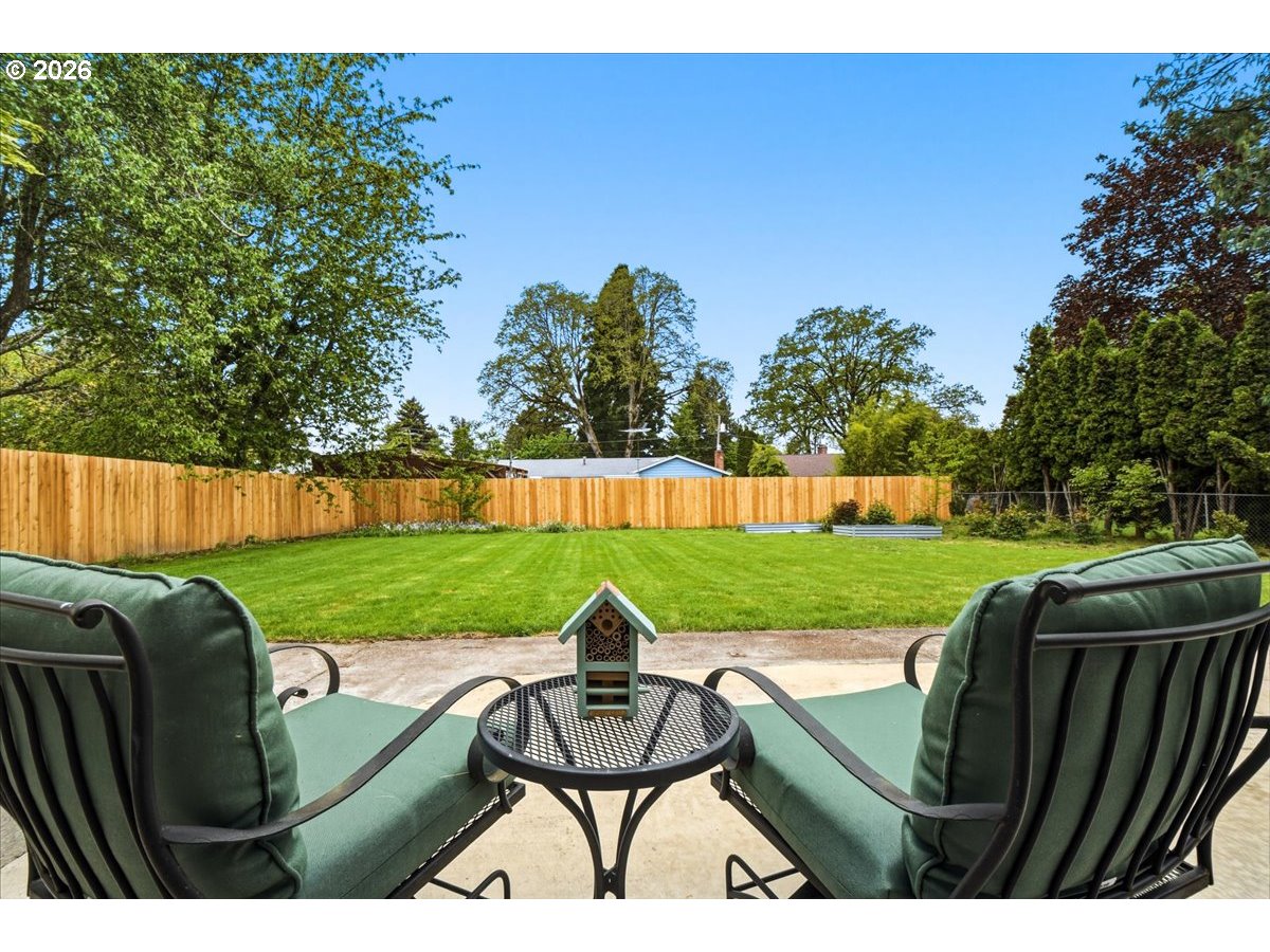 4620 Southwest 183rd Court Beaverton, OR 97078 - Photo 24 of 34 a view of a chairs and table in the garden