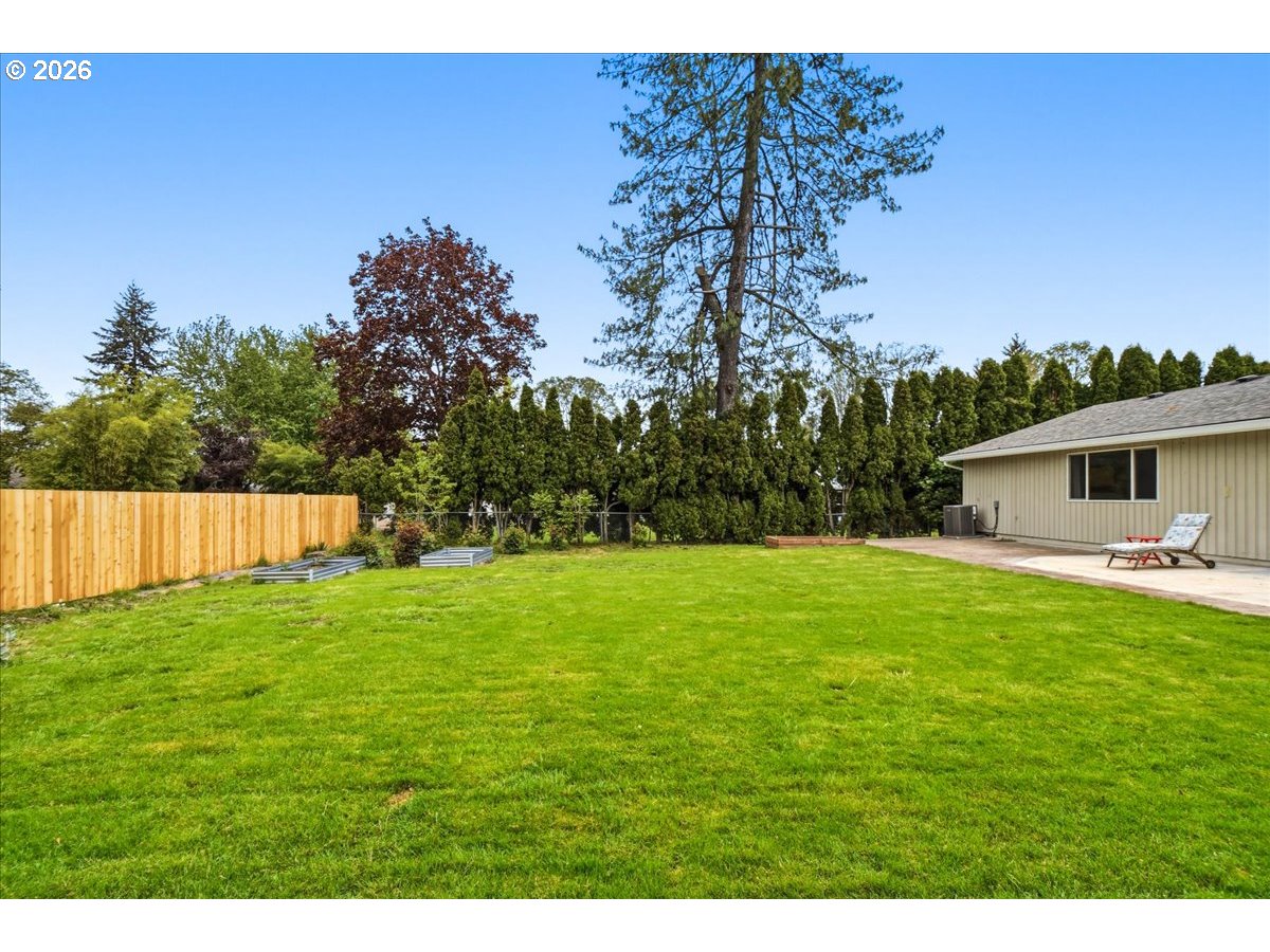 4620 Southwest 183rd Court Beaverton, OR 97078 - Photo 26 of 34 a backyard of a house with lots of green space