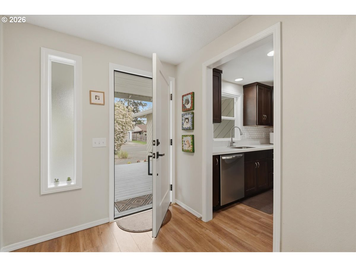 4620 Southwest 183rd Court Beaverton, OR 97078 - Photo 3 of 34 a bathroom with a sink and a mirror