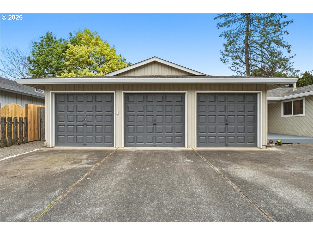 4620 Southwest 183rd Court Beaverton, OR 97078 - Photo 32 of 34 a front view of a house with a garage