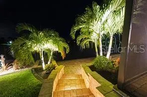 an aerial view of houses with yard