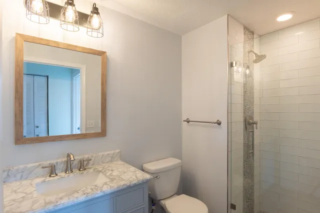 an aerial view of a golf course with a swimming pool