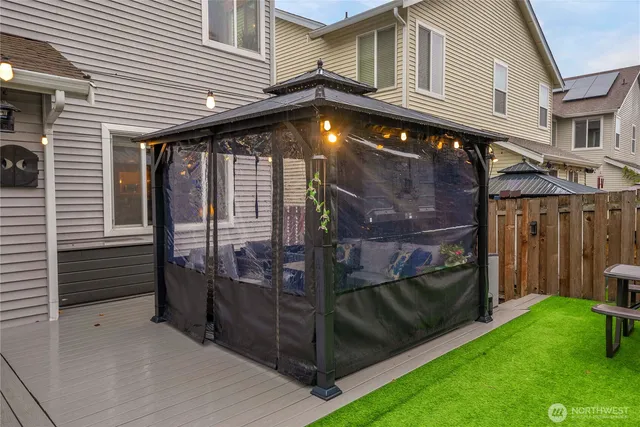 a view of a house with a small garden