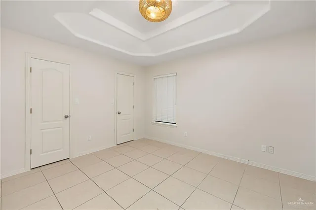 a bathroom with a toilet sink and shower