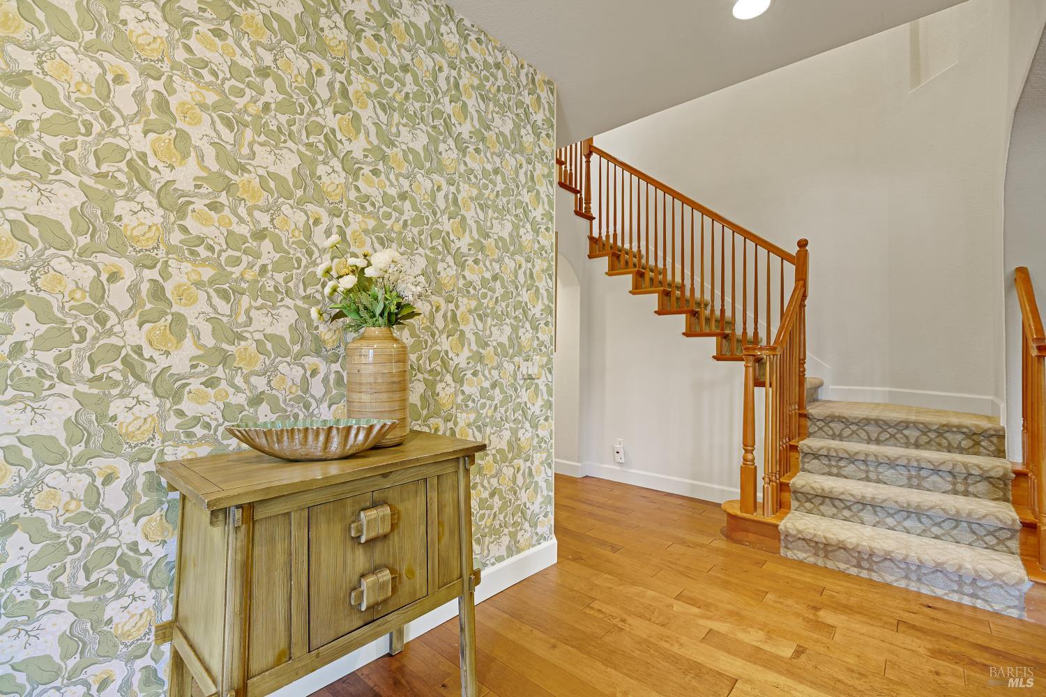 68 Pinheiro Circle Novato, CA 94945 - Photo 82 of 82 Thoughtfully designed living spaces are connected by elegant archways and a welcoming staircase, creating an open yet comfortable feel. The flexible floor plan offers room to gather, work, or simply unwind.